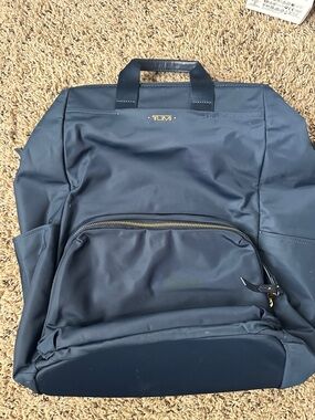 Tumi Navy Blue Backpack with Gold Accents